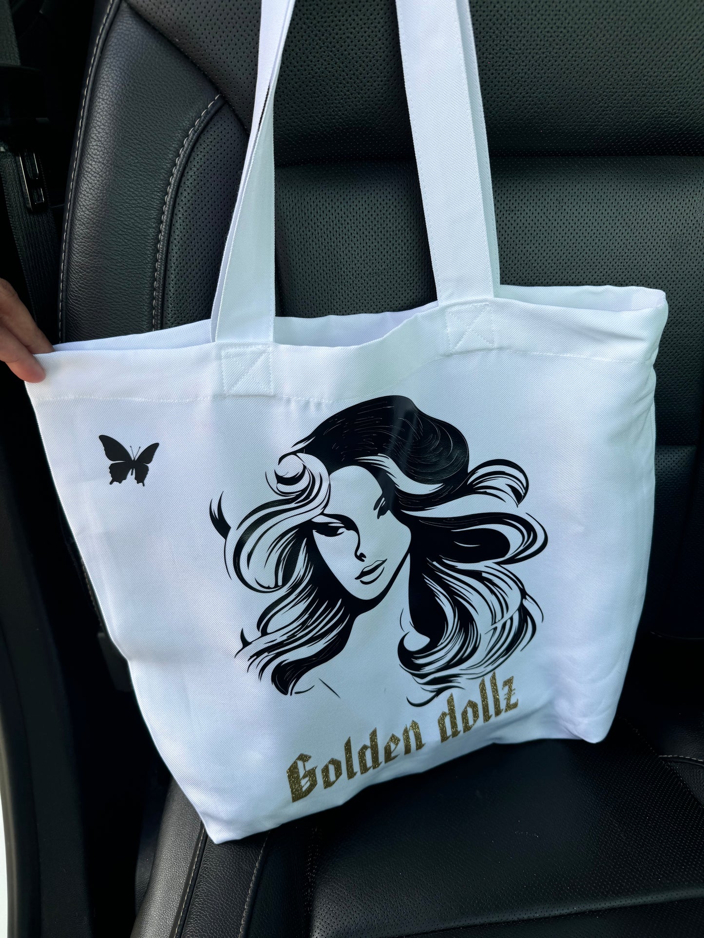 Golden dollz tote bags