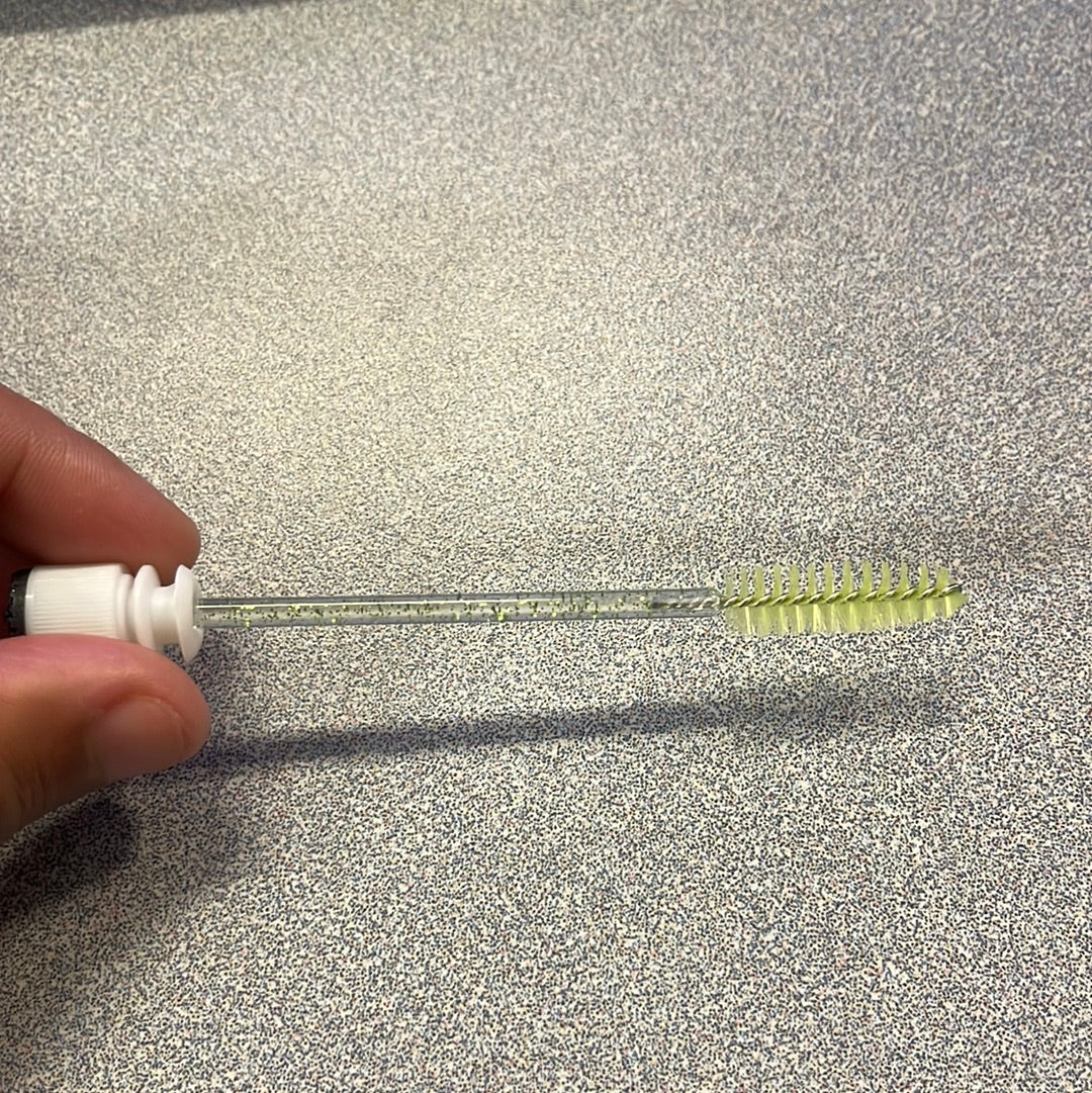 Eye lash brush